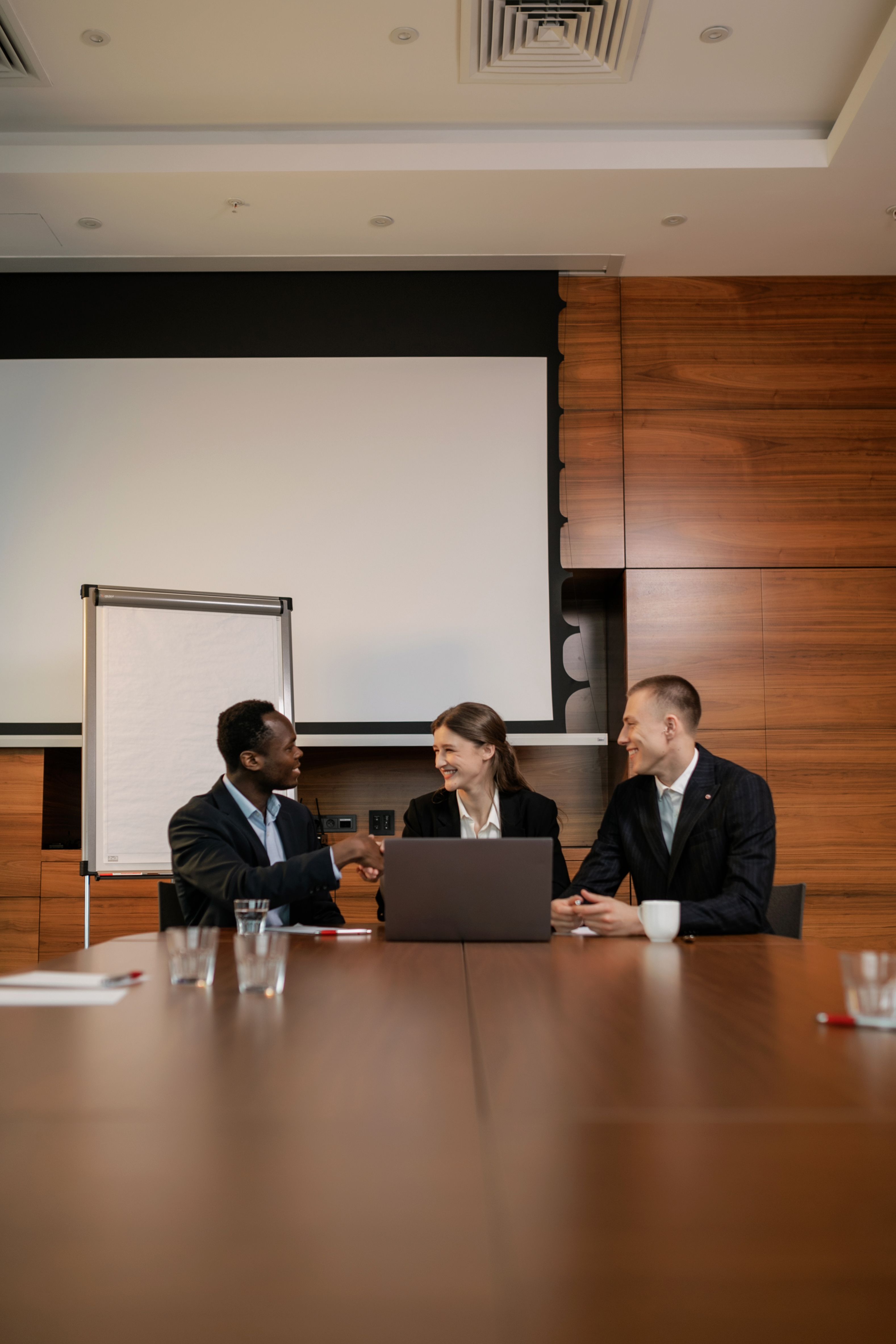 Business owners shaking hands with the C2B Scaling team